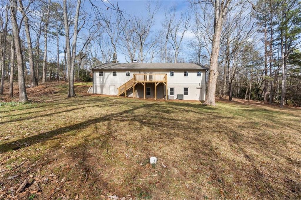 49 Apache Trail Cartersville, GA 30120 - Photo 46 of 52 a view of a house with a yard