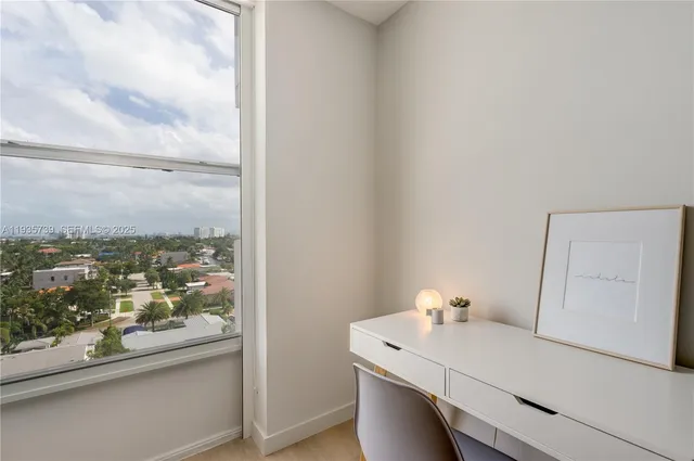 a room with a table and chairs