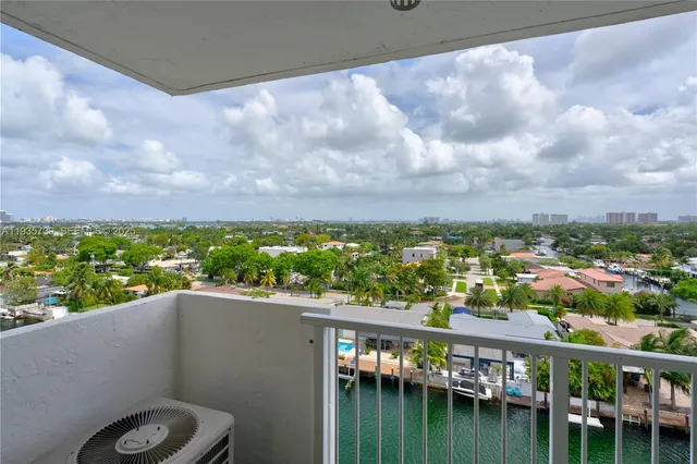 a view of a lake from a balcony