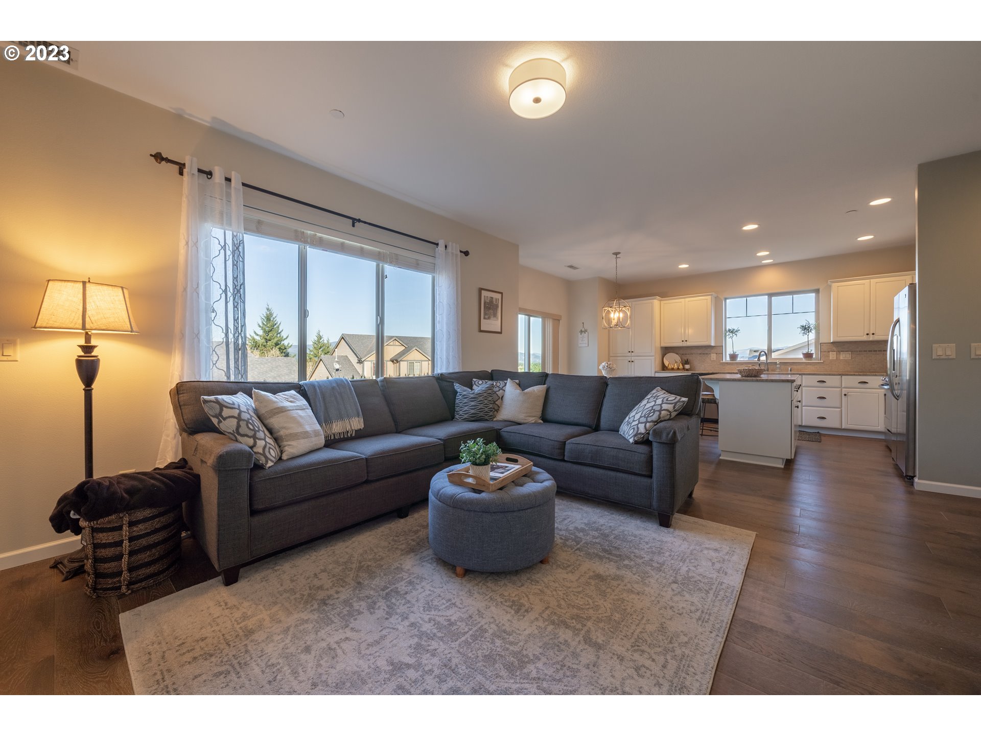 2909 Northwest Hill Street Camas, WA 98607 - Photo 14 of 42 a living room with a couch and a view of kitchen