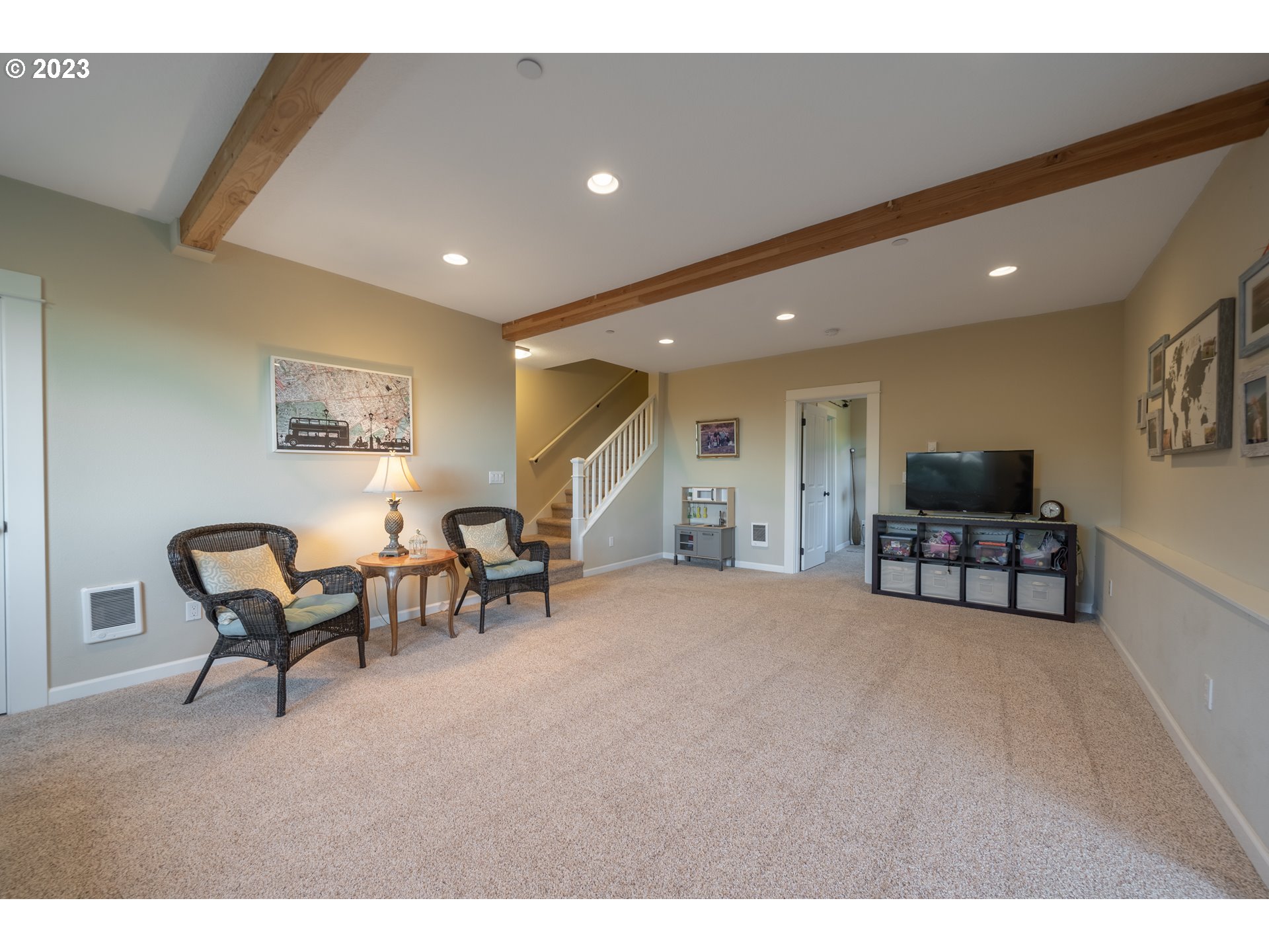 2909 Northwest Hill Street Camas, WA 98607 - Photo 20 of 42 a living room with furniture and a flat screen tv