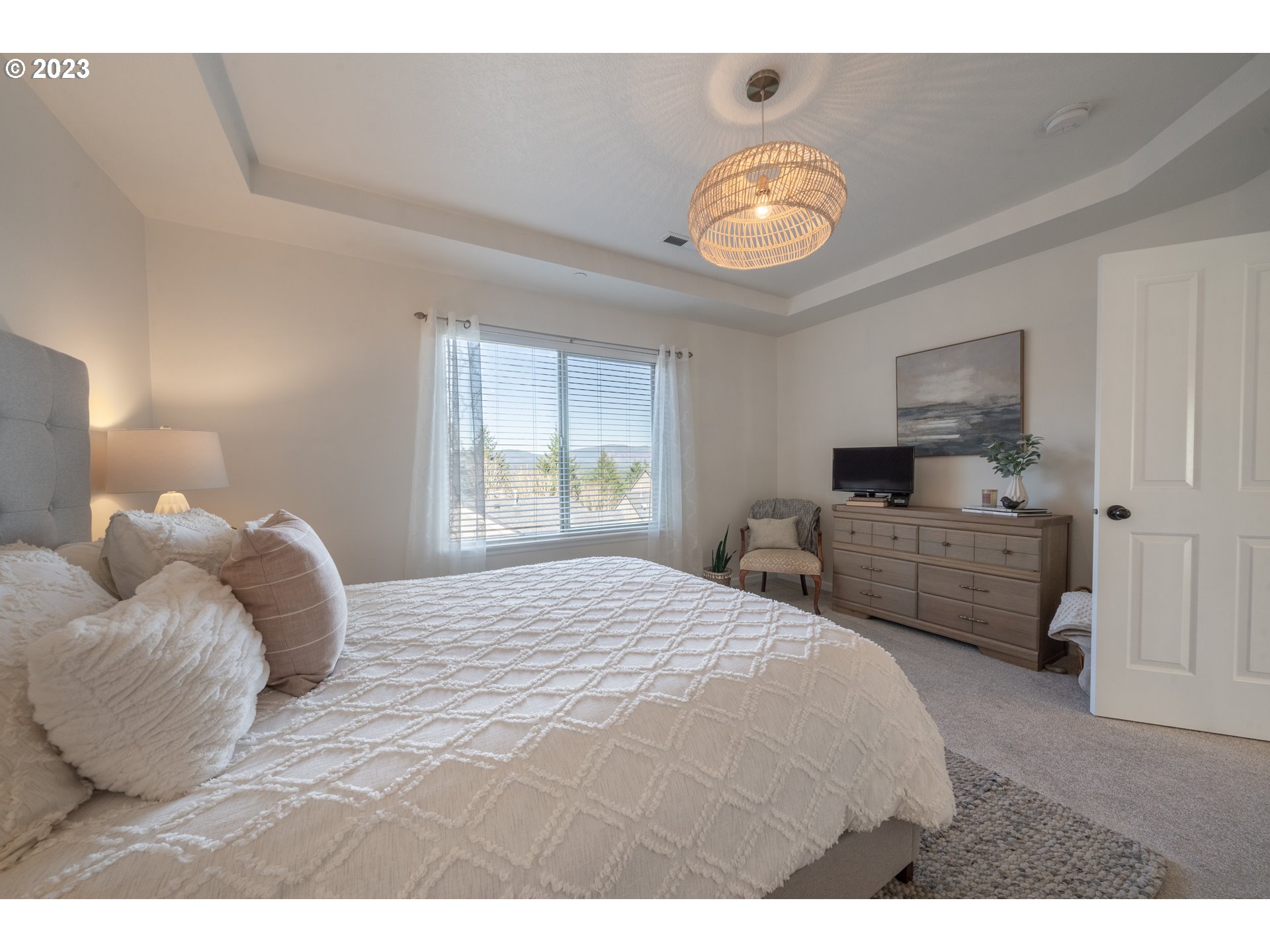 2909 Northwest Hill Street Camas, WA 98607 - Photo 25 of 42 a bedroom with a bed and a large window