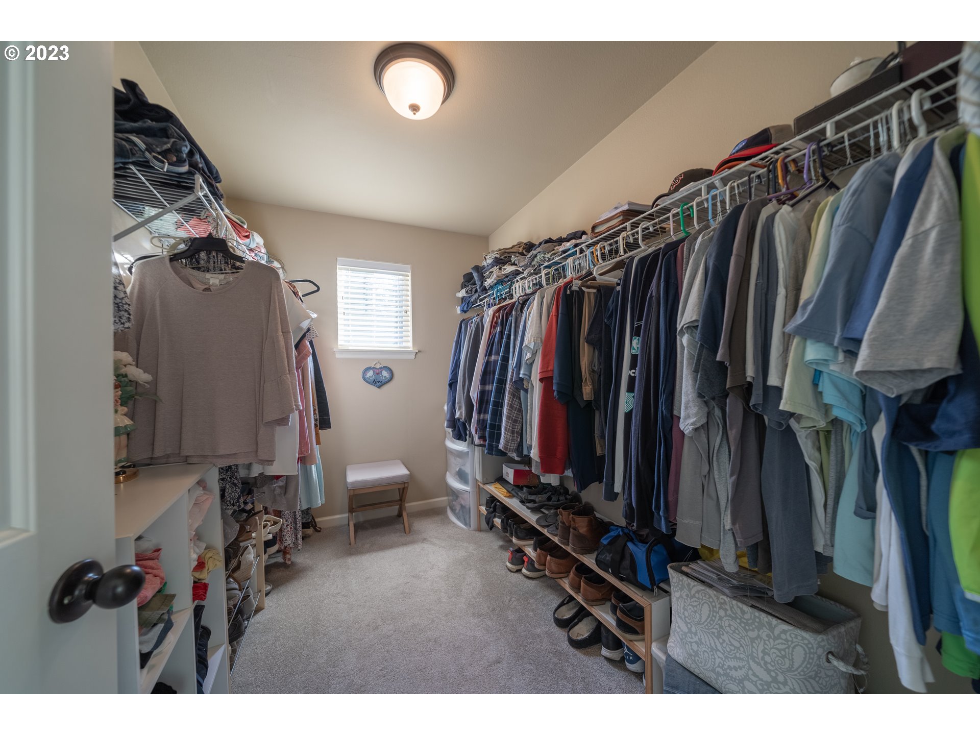 2909 Northwest Hill Street Camas, WA 98607 - Photo 29 of 42 a view of walk in closet with clothes and shoes