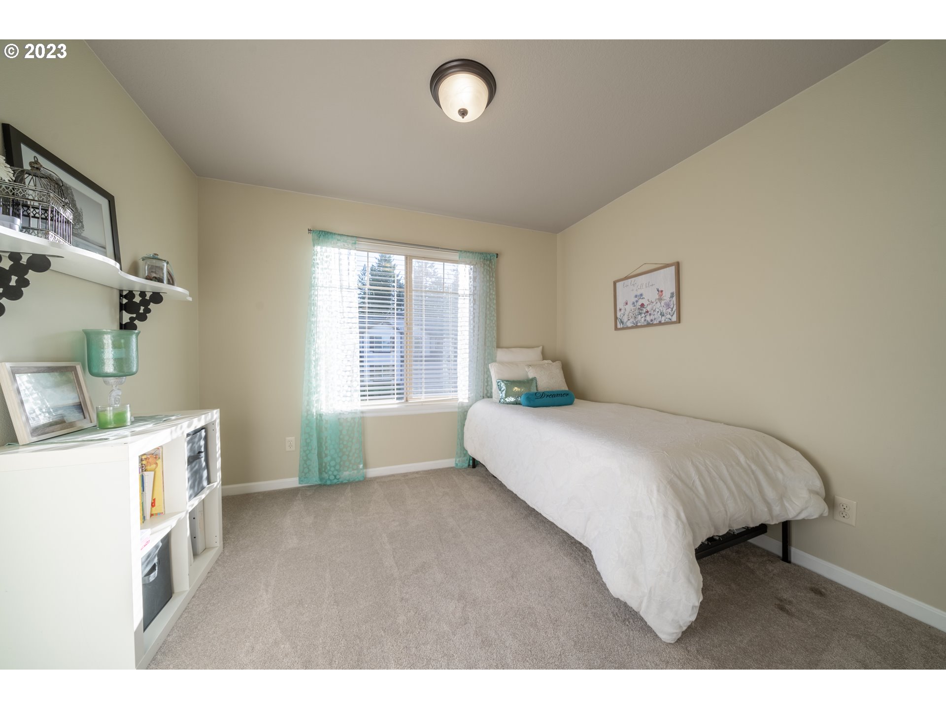 2909 Northwest Hill Street Camas, WA 98607 - Photo 30 of 42 a bedroom with a bed and a window