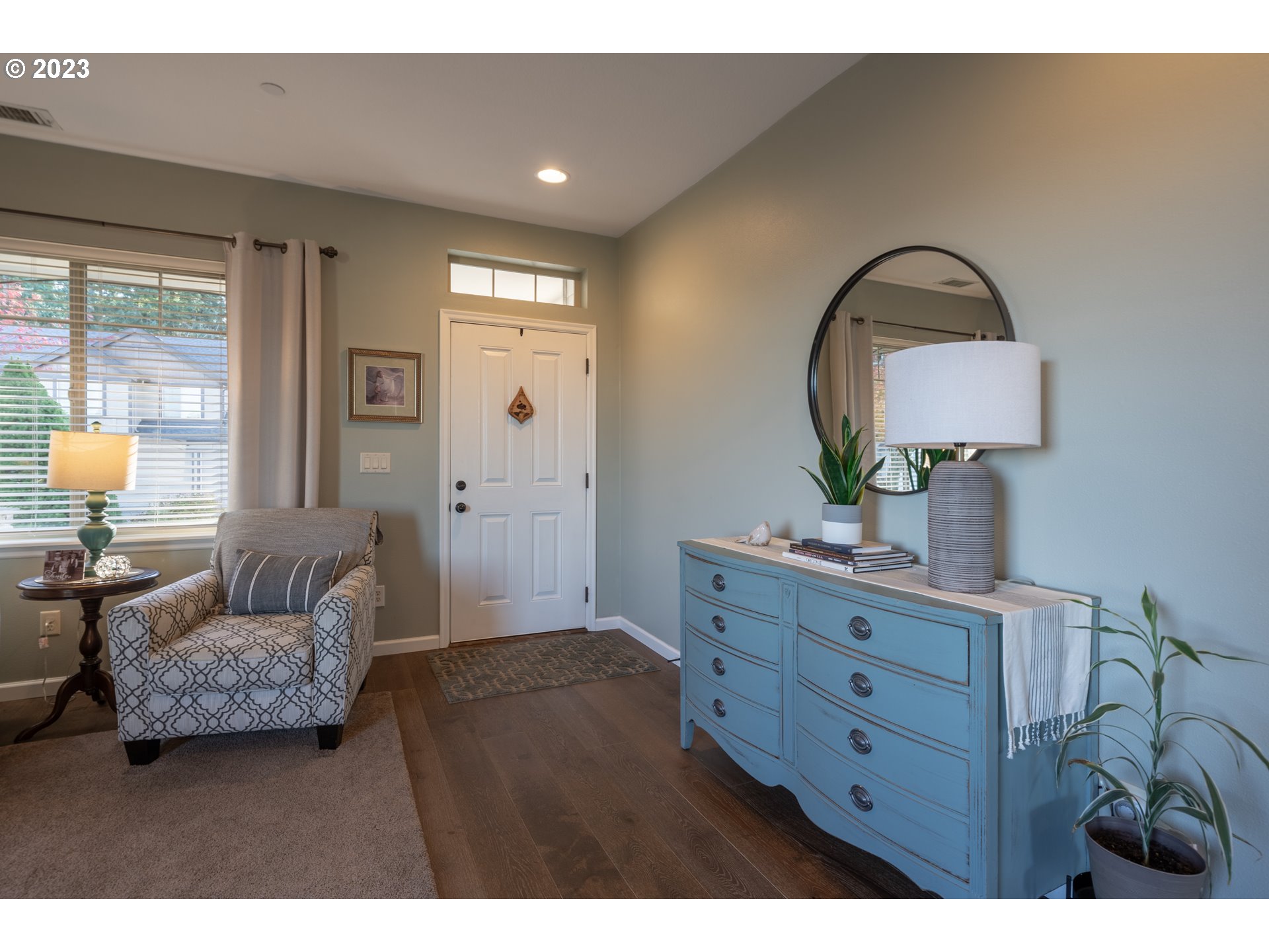 2909 Northwest Hill Street Camas, WA 98607 - Photo 3 of 42 a bedroom with furniture and a mirror