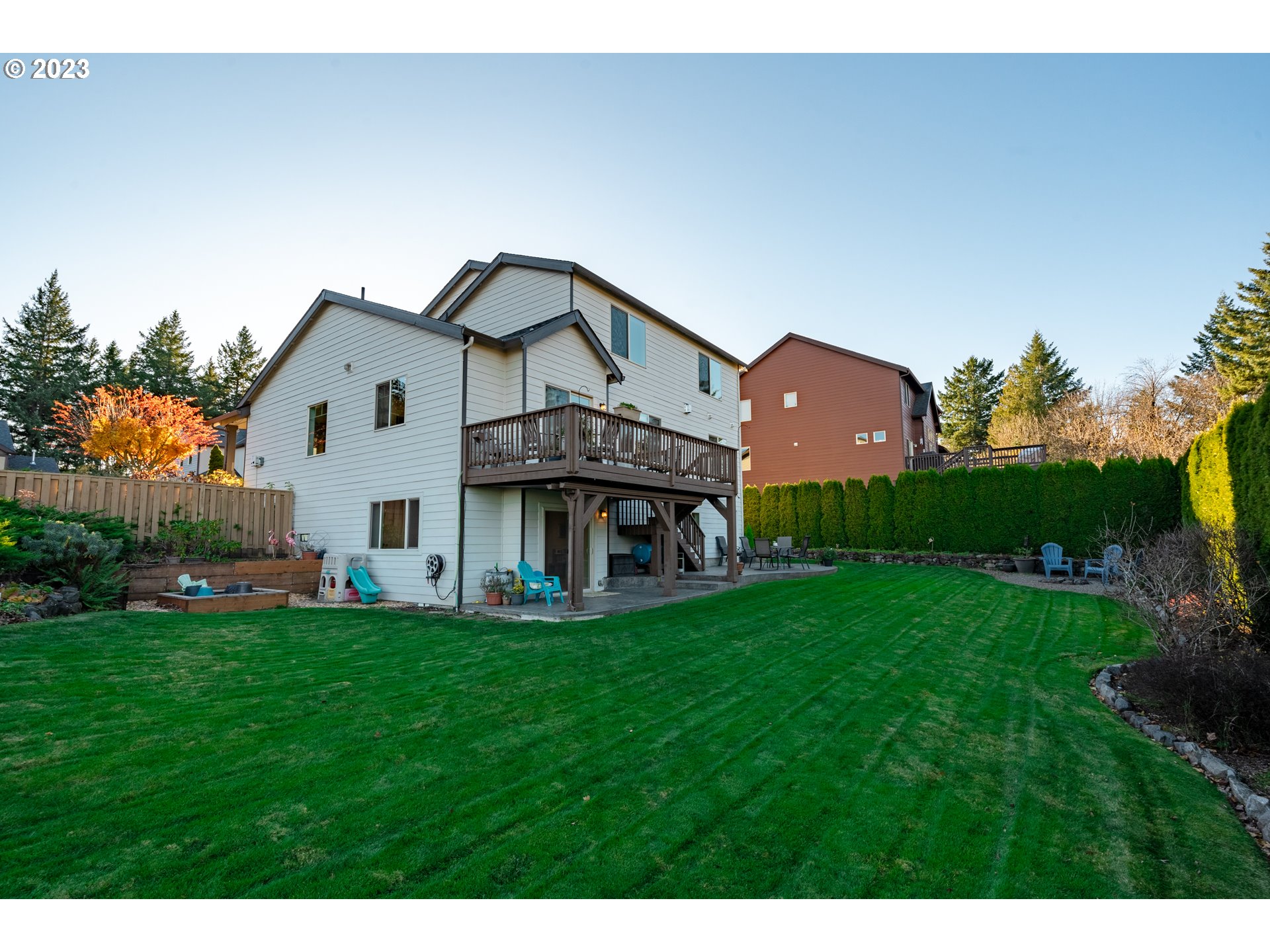 2909 Northwest Hill Street Camas, WA 98607 - Photo 35 of 42 a view of a house with a big yard and large trees