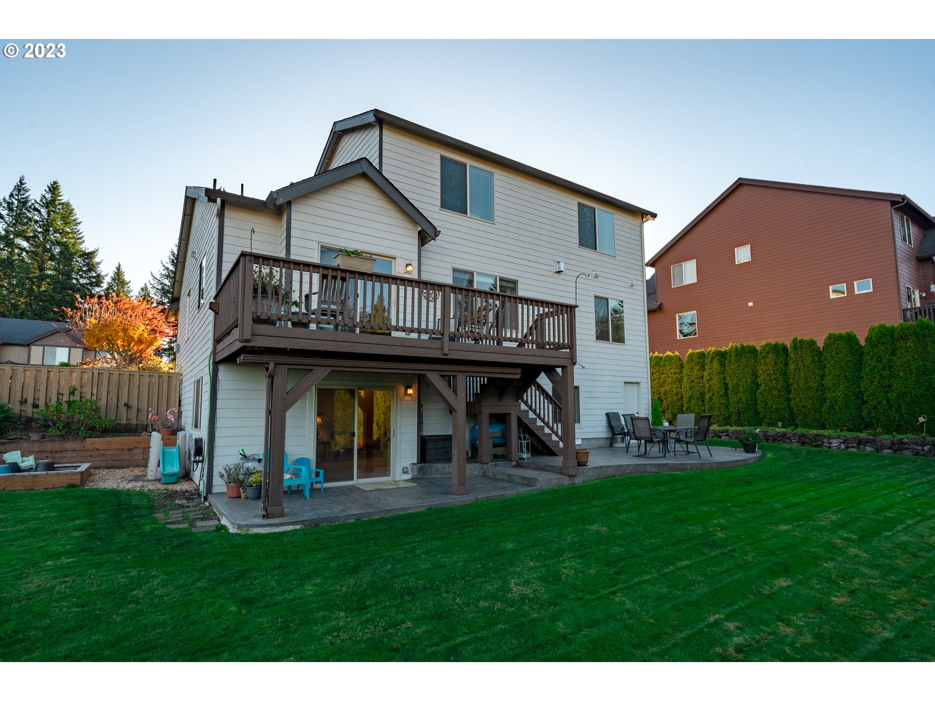2909 Northwest Hill Street Camas, WA 98607 - Photo 36 of 42 a view of a house with a yard and deck
