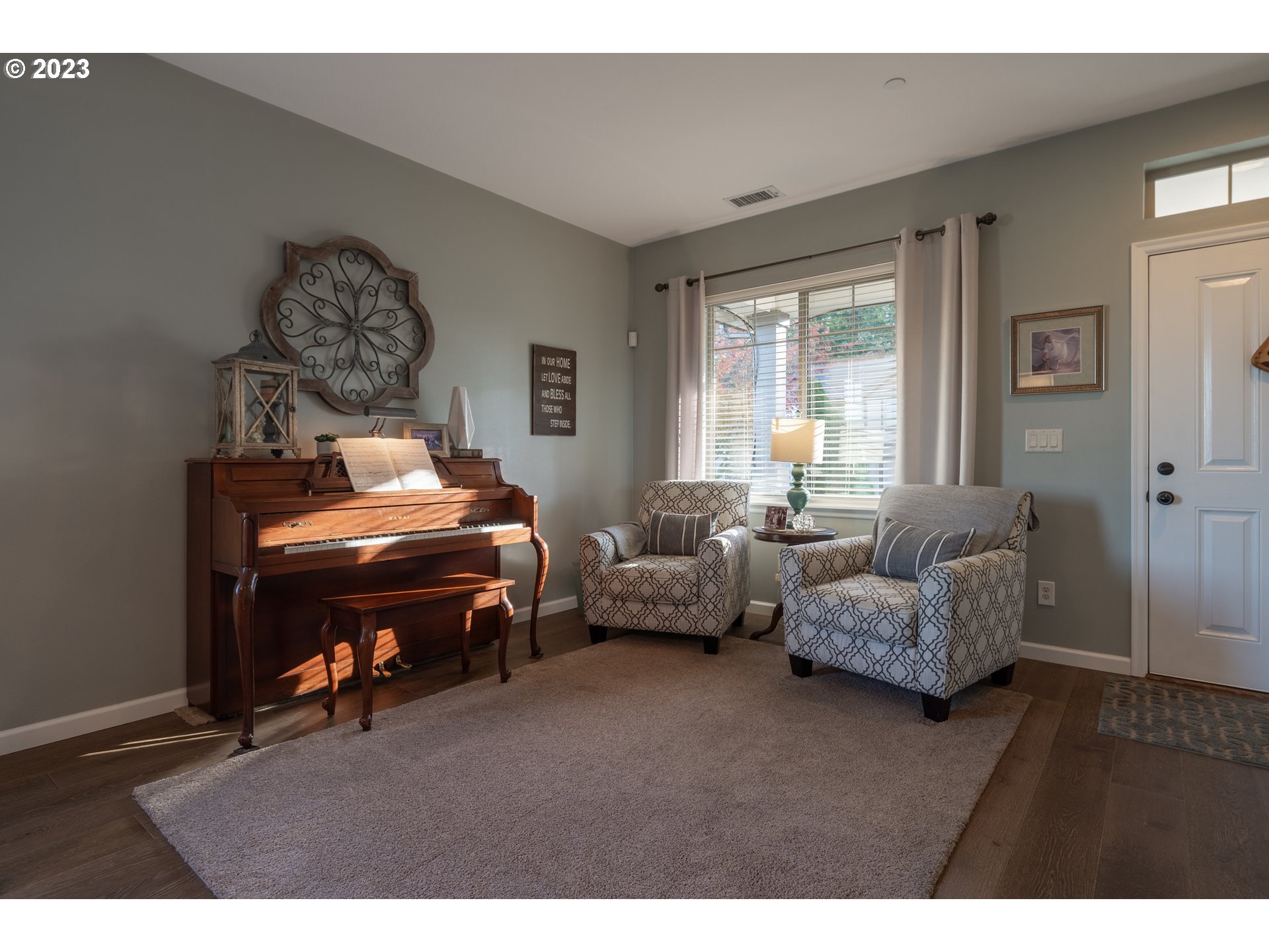 2909 Northwest Hill Street Camas, WA 98607 - Photo 4 of 42 a living room with furniture and a piano