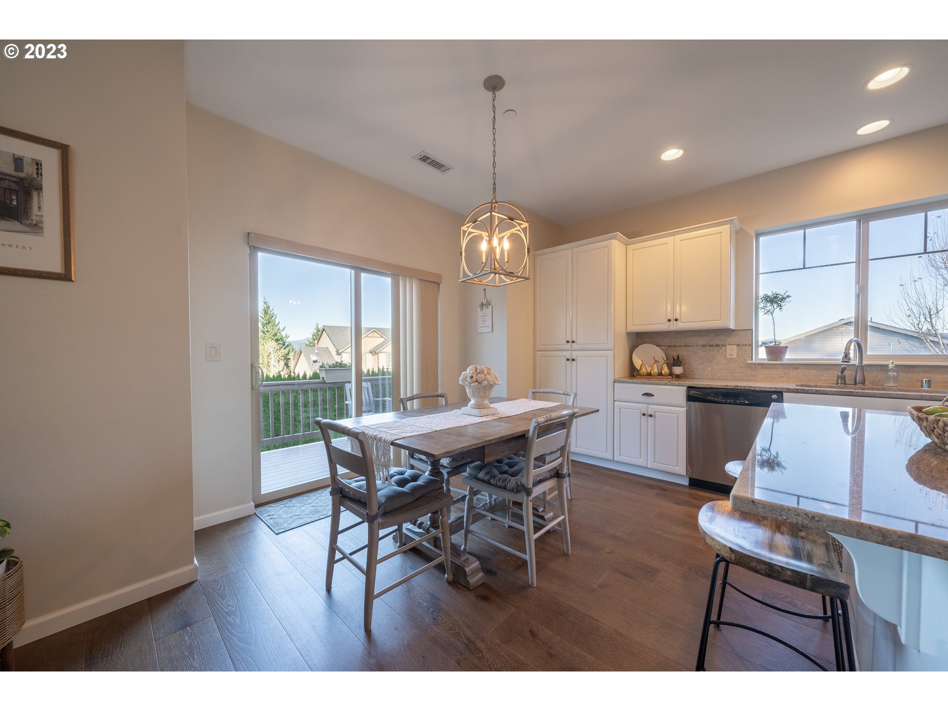 2909 Northwest Hill Street Camas, WA 98607 - Photo 9 of 42 a view of a dining room with furniture window and wooden floor