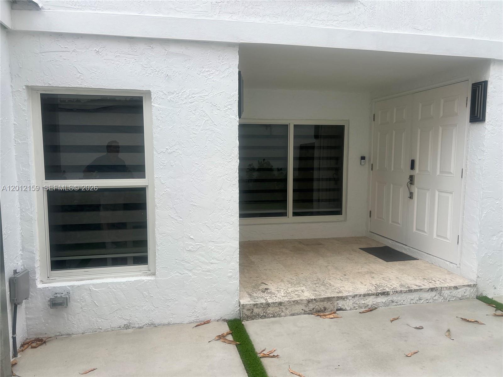13595 Southwest 99th Street Miami, FL 33186 - Photo 10 of 44 a view of entryway of the house