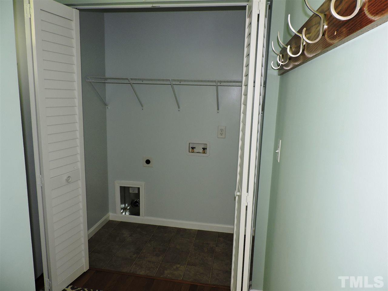 602 East Stagecoach Road Mebane, NC 27302 - Photo 10 of 20 Laundry closet is off the kitchen/dining area near the back door.