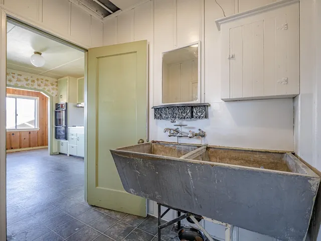a utility room with washer and dryer
