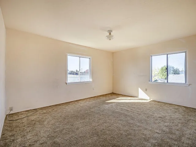 a view of a chandelier in big room