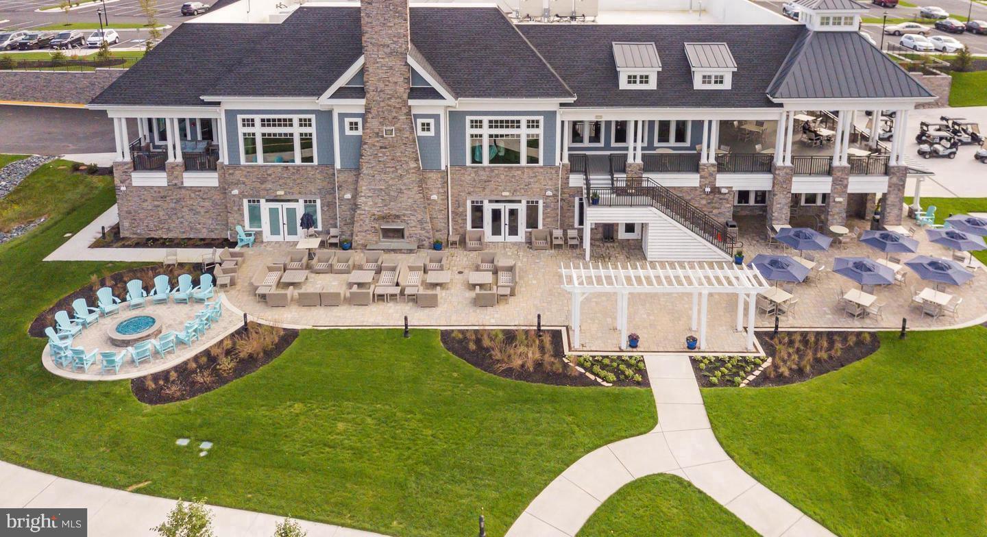 35393 Wright Way Millsboro, DE 19966 - Photo 22 of 28 a front view of a house with garden