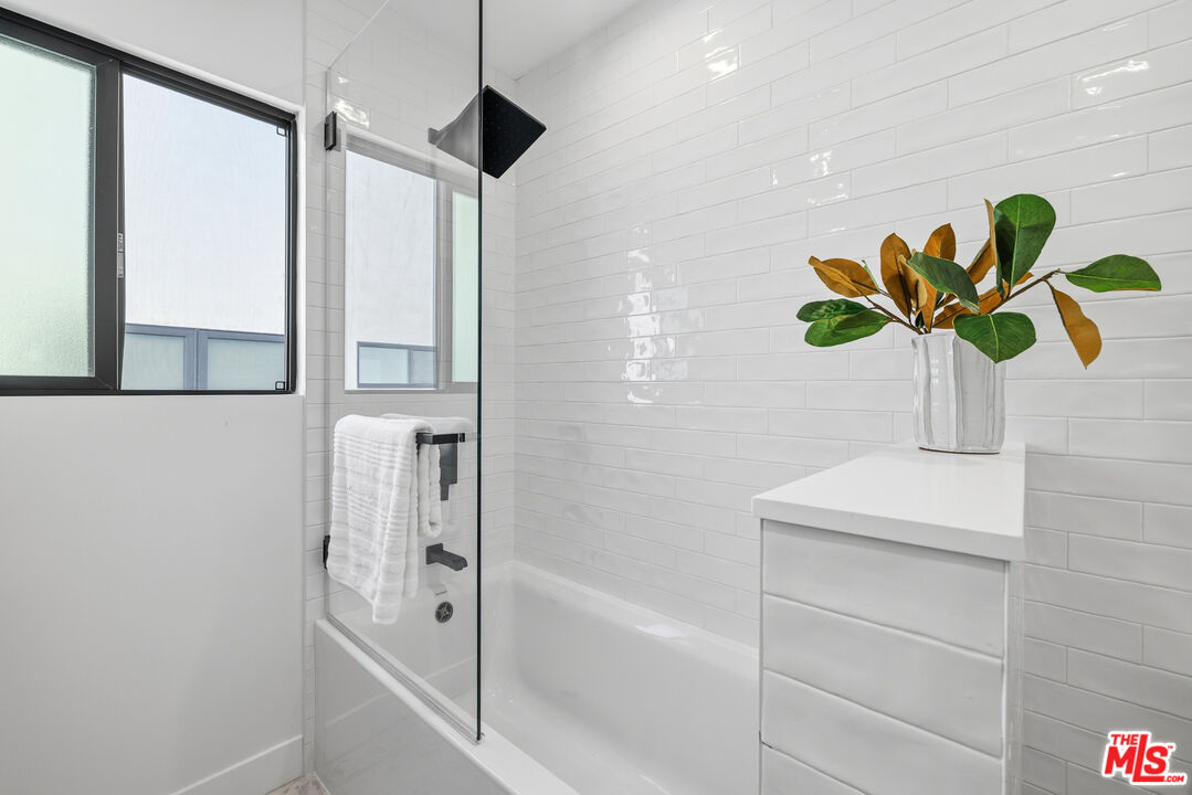 5032 Bluebell Avenue Valley Village, CA 91607 - Photo 16 of 75 a bathroom with a shower