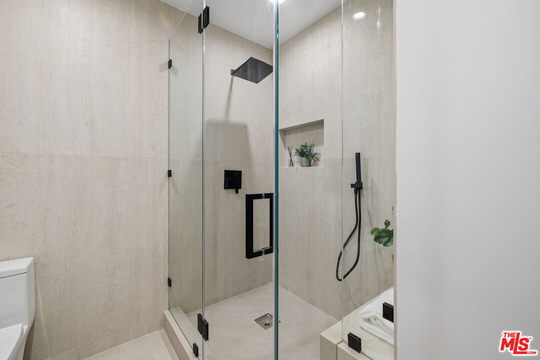 5032 Bluebell Avenue Valley Village, CA 91607 - Photo 30 of 75 a bathroom with a shower