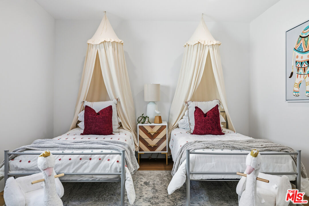 5032 Bluebell Avenue Valley Village, CA 91607 - Photo 33 of 75 a bedroom with two beds and painted walls