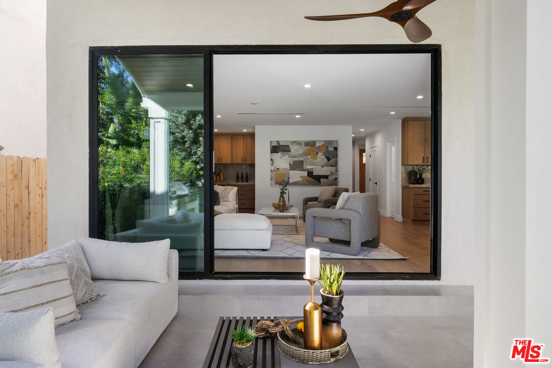 5032 Bluebell Avenue Valley Village, CA 91607 - Photo 54 of 75 a living room with furniture and a potted plant