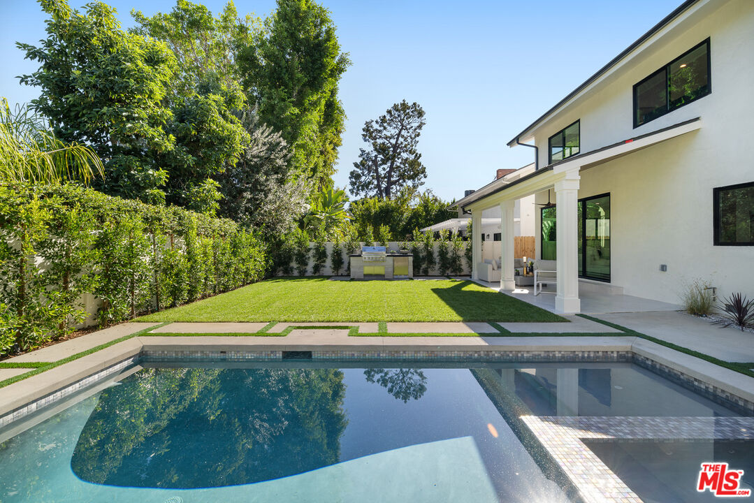 5032 Bluebell Avenue Valley Village, CA 91607 - Photo 57 of 75 a view of swimming pool with a patio