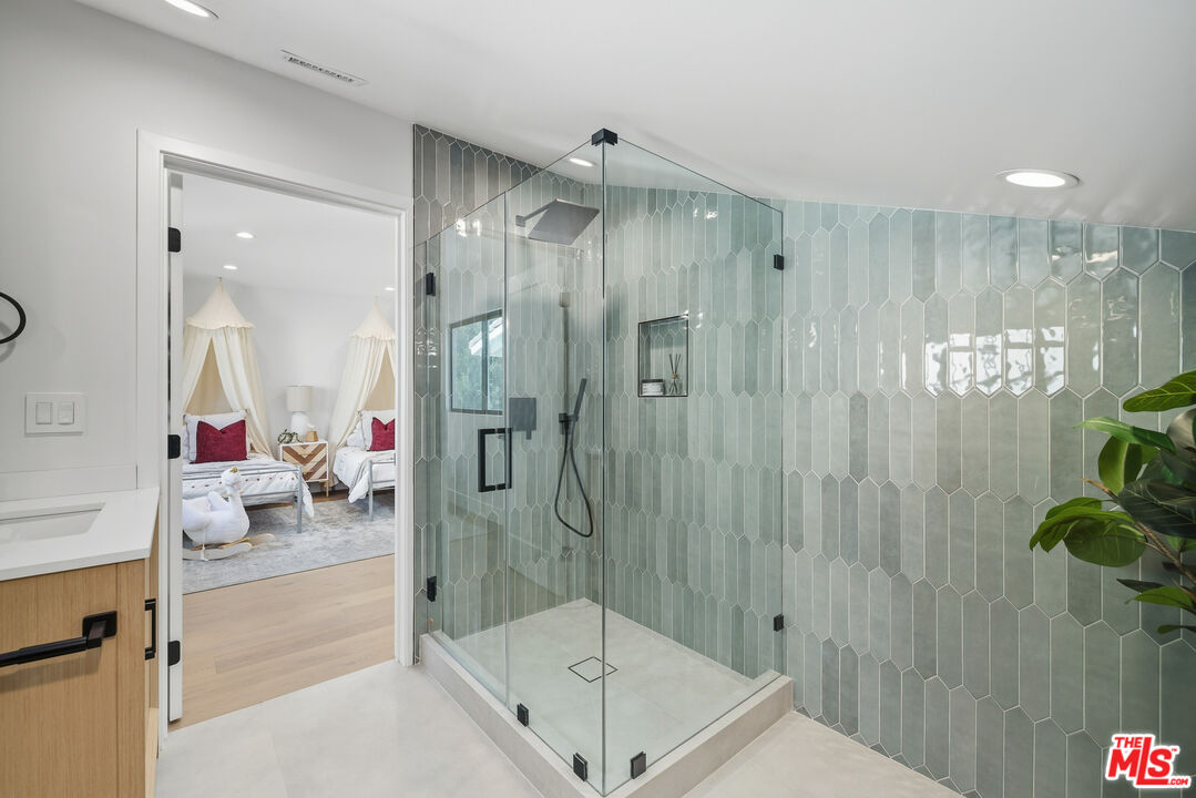 5032 Bluebell Avenue Valley Village, CA 91607 - Photo 6 of 75 a bathroom with a shower