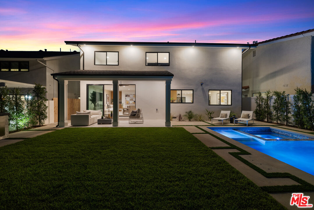 5032 Bluebell Avenue Valley Village, CA 91607 - Photo 69 of 75 a front view of a house with swimming pool yard and outdoor seating