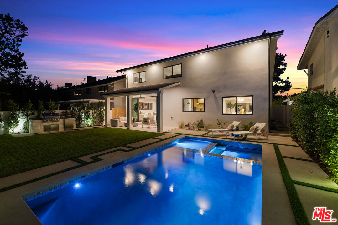 5032 Bluebell Avenue Valley Village, CA 91607 - Photo 70 of 75 a front view of a house with swimming pool having outdoor seating