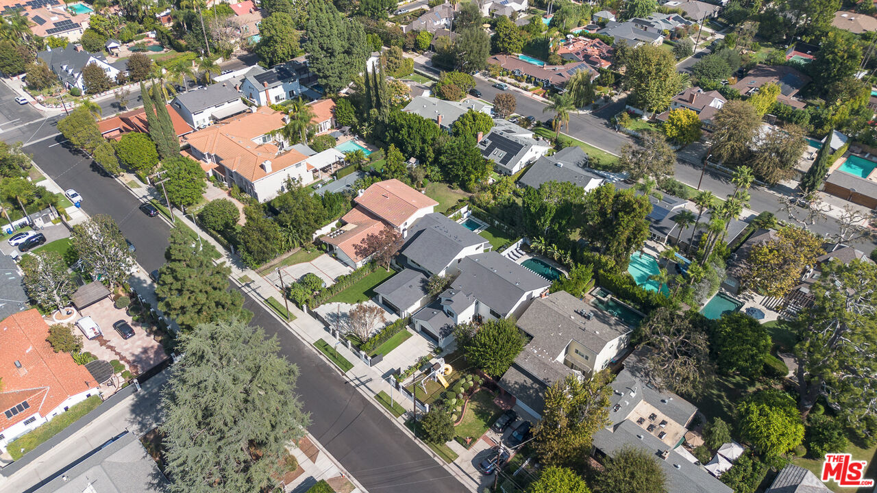 5032 Bluebell Avenue Valley Village, CA 91607 - Photo 71 of 75 an aerial view of a house with a yard