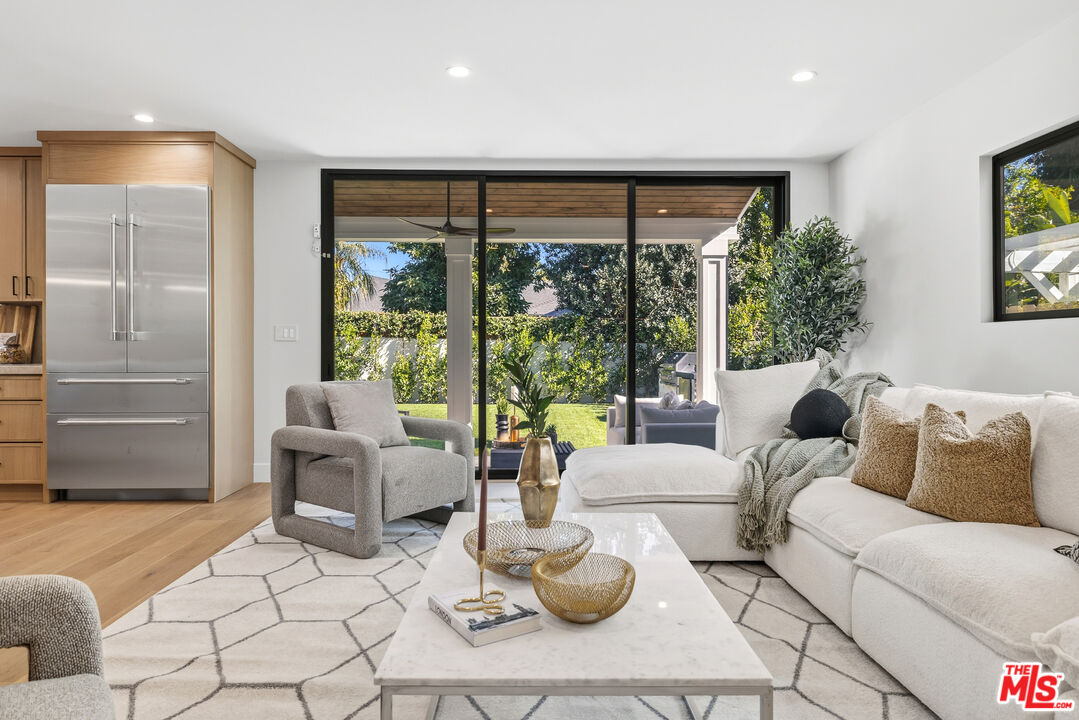 5032 Bluebell Avenue Valley Village, CA 91607 - Photo 8 of 75 a living room with furniture and a large window