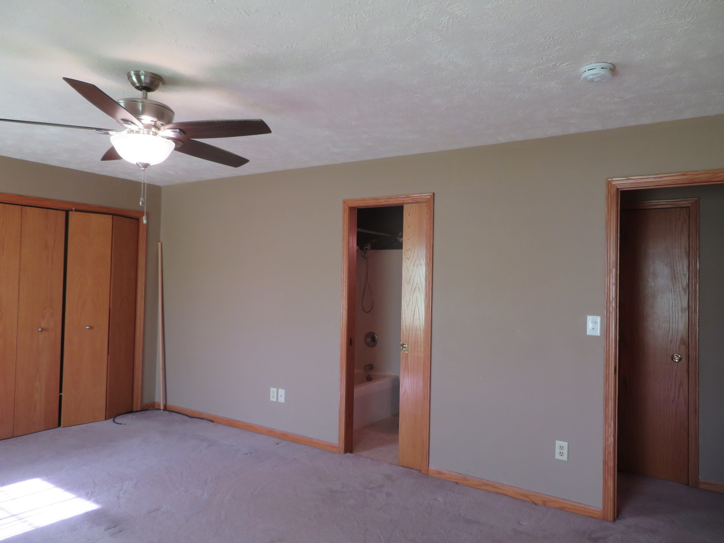 440 South Peace Road, Unit 440 Sycamore, IL 60178 - Photo 10 of 19 a view of an empty room with a window