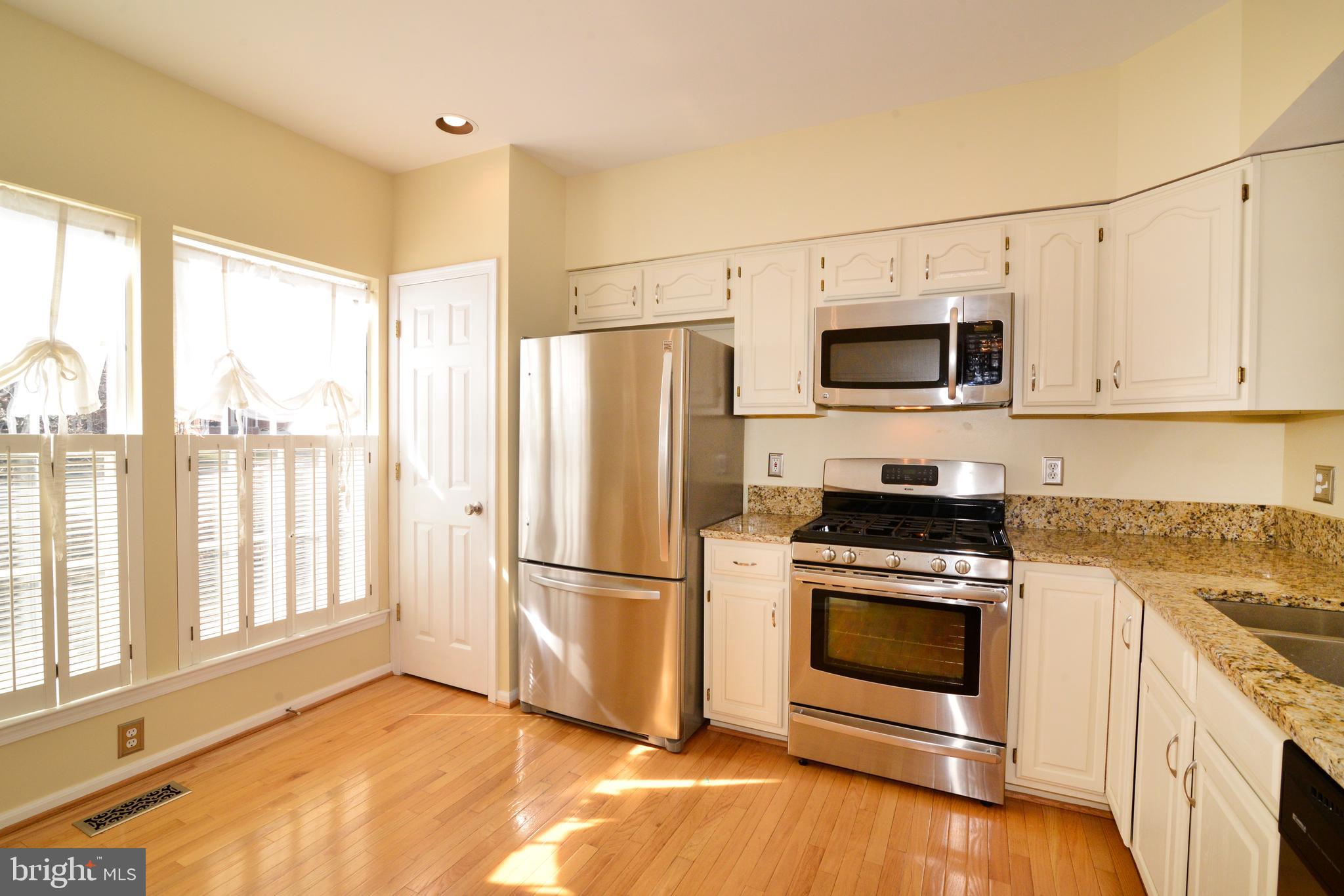 1384 Park Garden Lane Reston, VA 20194 - Photo 2 of 38 The table-space kitchen offers great room!