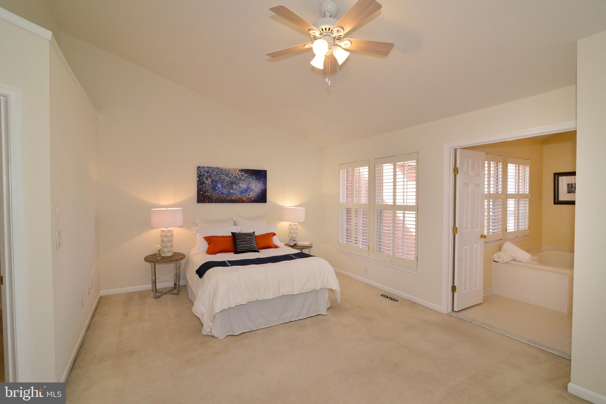 1384 Park Garden Lane Reston, VA 20194 - Photo 17 of 38 The owner's suite has a vaulted ceiling.