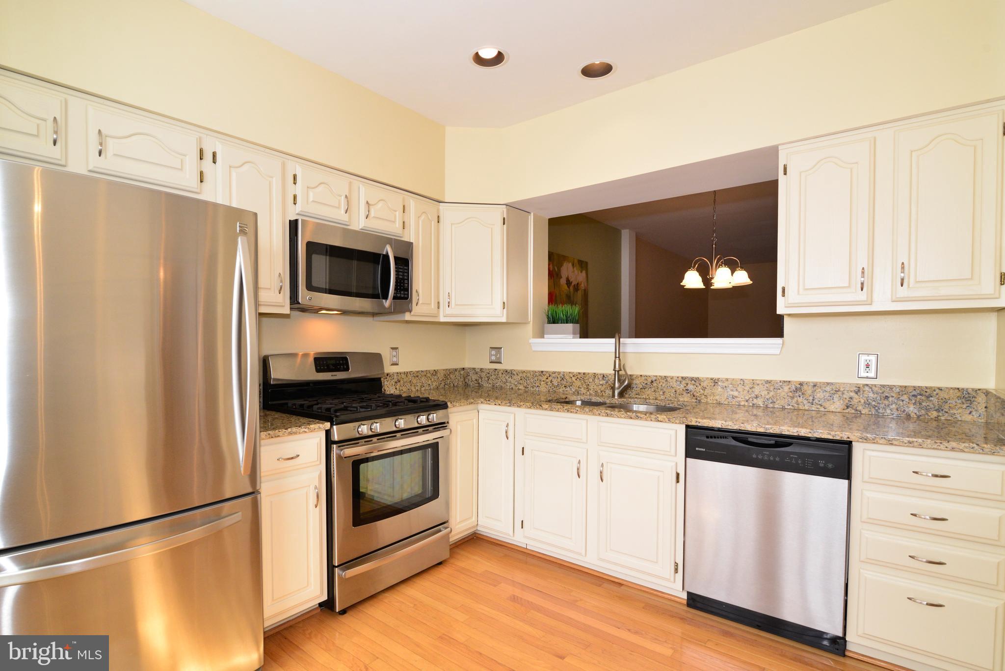 1384 Park Garden Lane Reston, VA 20194 - Photo 3 of 38 The kitchen has stainless steel appliances!