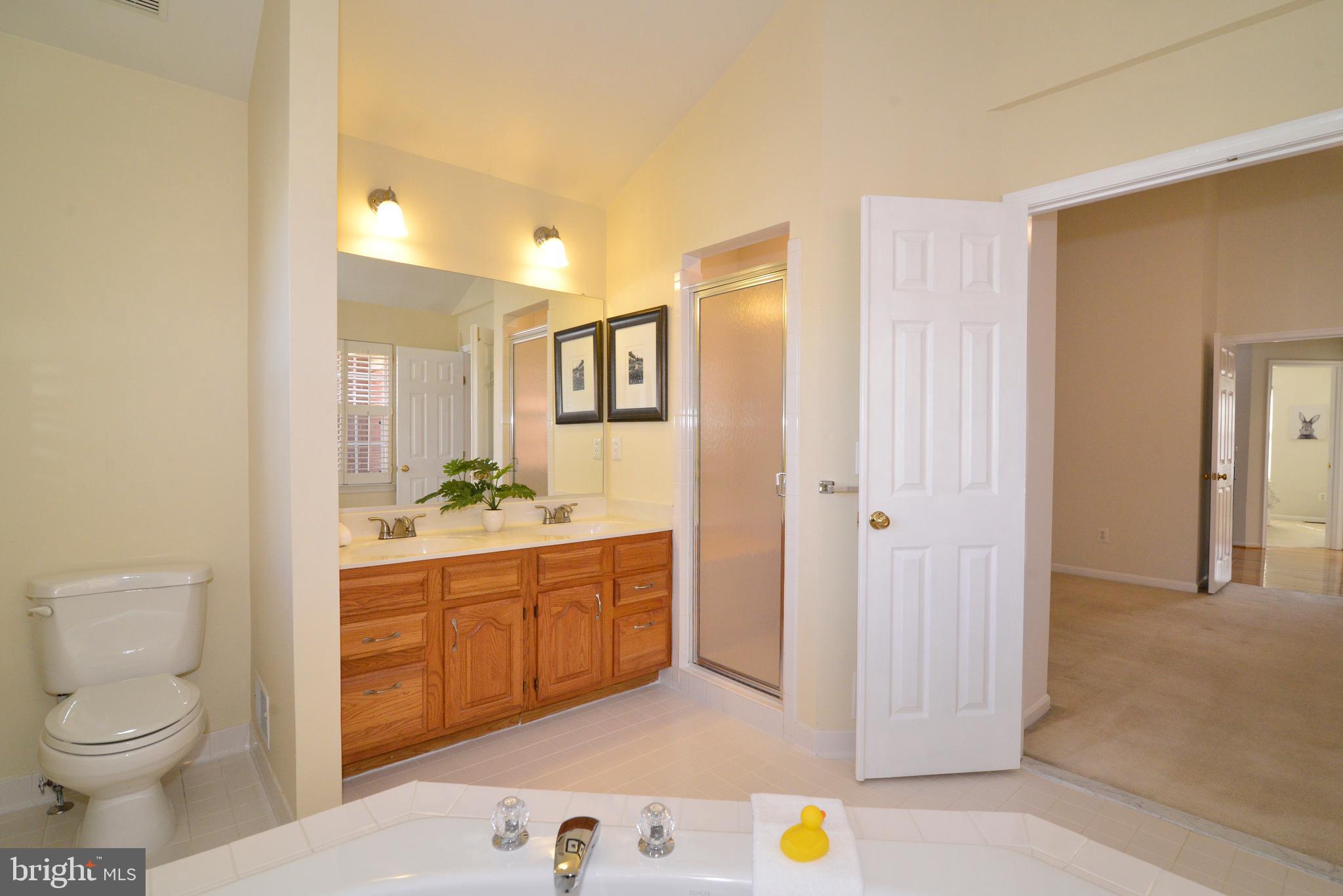 1384 Park Garden Lane Reston, VA 20194 - Photo 24 of 38 There are double vanity sinks in the owner's suite