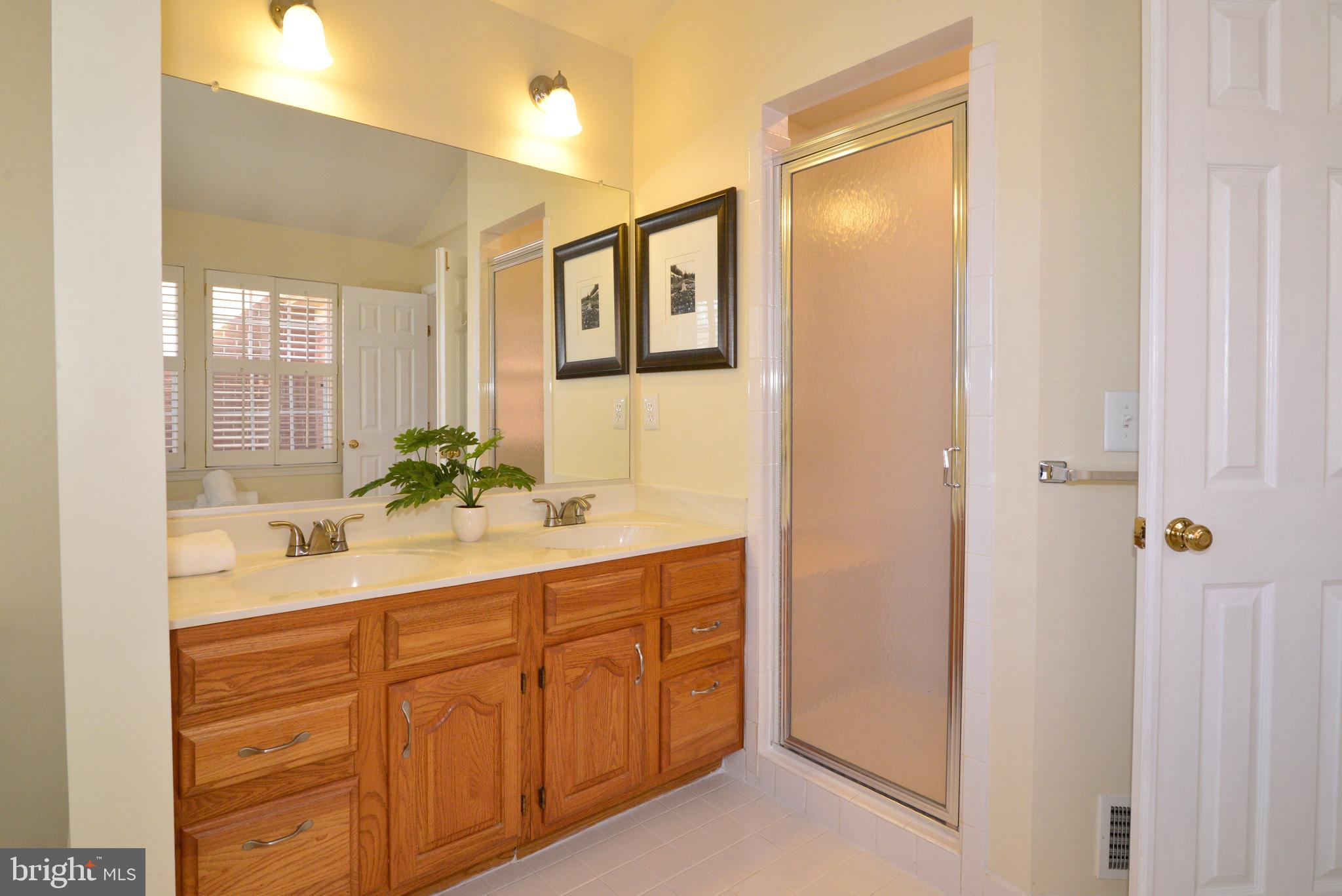 1384 Park Garden Lane Reston, VA 20194 - Photo 25 of 38 There is also a separate ceramic tile shower.