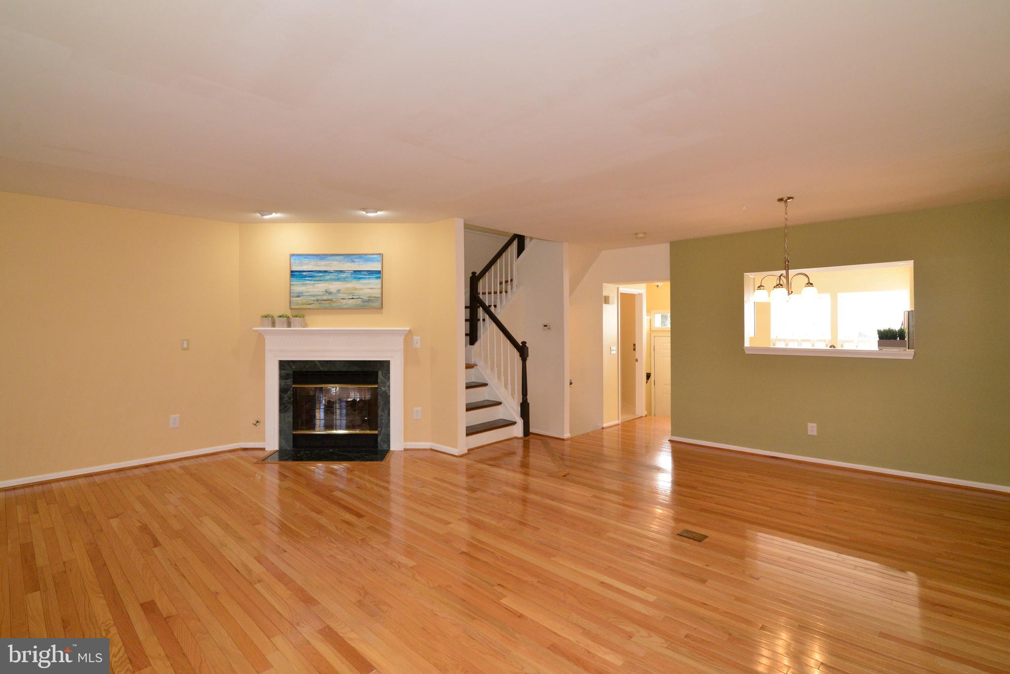 1384 Park Garden Lane Reston, VA 20194 - Photo 9 of 38 The living room has a gas fireplace.