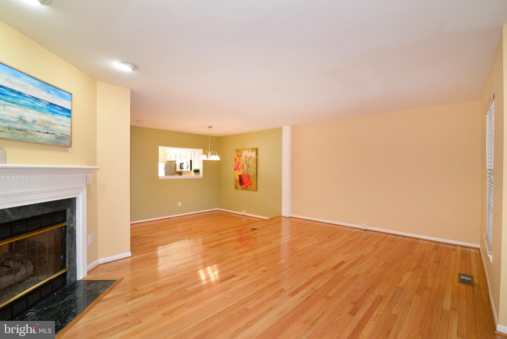 1384 Park Garden Lane Reston, VA 20194 - Photo 10 of 38 The living room offers great space and light.