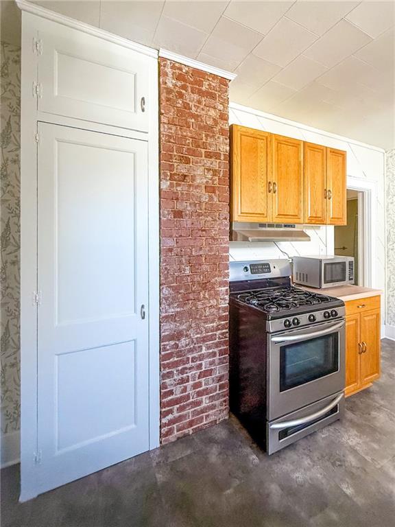 129 Missoura Street Somerset, PA 15501 - Photo 15 of 50 a kitchen with a stove and a refrigerator