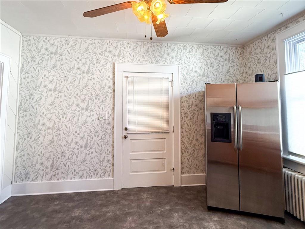 129 Missoura Street Somerset, PA 15501 - Photo 16 of 50 a view of a refrigerator in kitchen and an empty room
