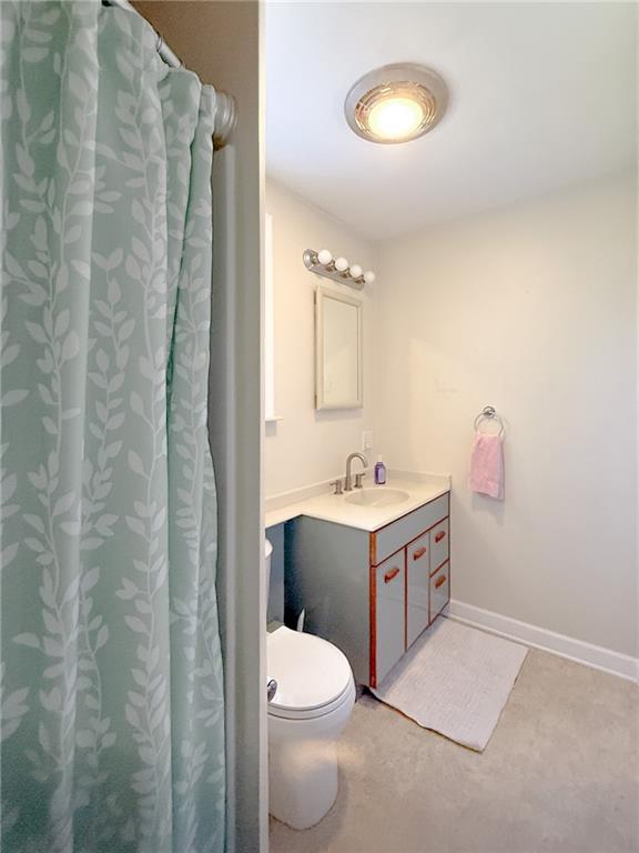 129 Missoura Street Somerset, PA 15501 - Photo 20 of 50 a bathroom with a sink vanity and toilet