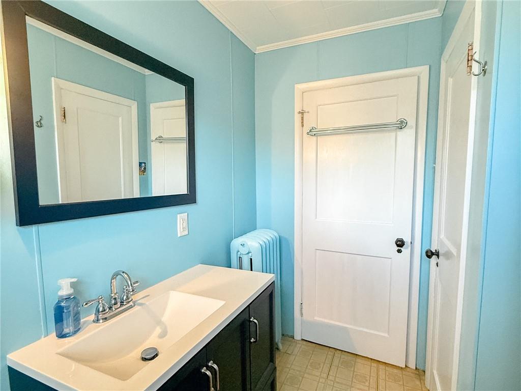 129 Missoura Street Somerset, PA 15501 - Photo 28 of 50 a bathroom with a sink vanity and a mirror