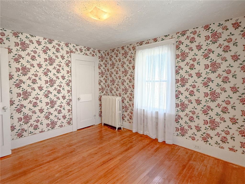 129 Missoura Street Somerset, PA 15501 - Photo 32 of 50 a view of a big room with a wooden floor and curtain