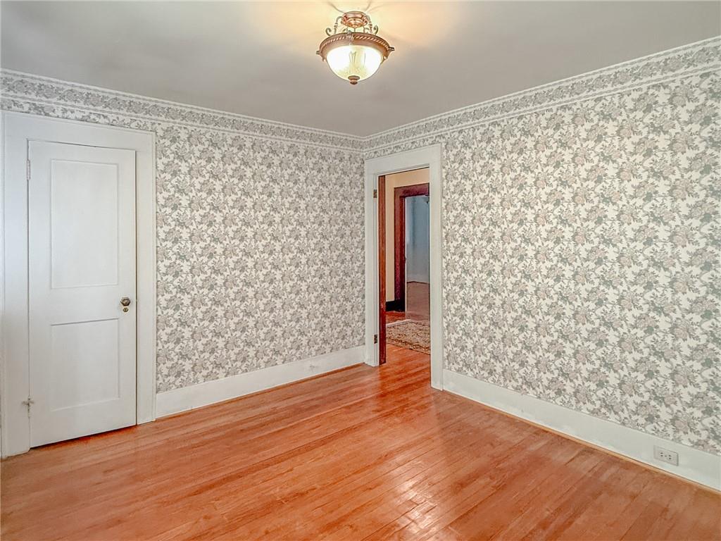 129 Missoura Street Somerset, PA 15501 - Photo 36 of 50 a view of empty room with wooden floor and fan