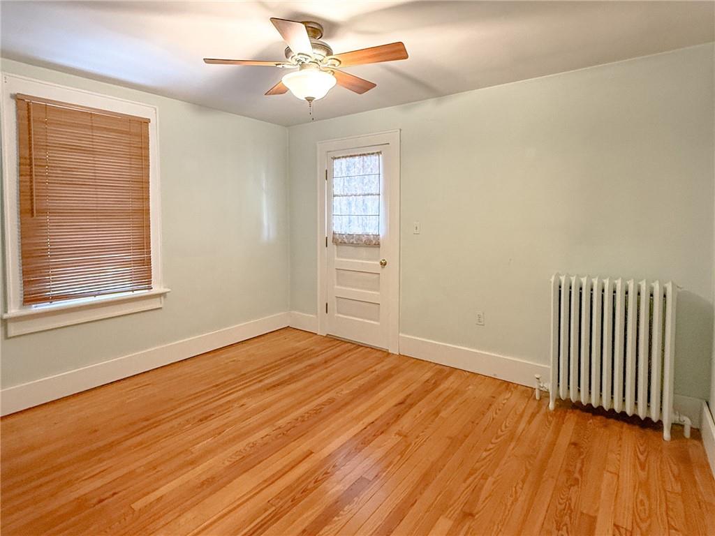 129 Missoura Street Somerset, PA 15501 - Photo 37 of 50 a view of an empty room with wooden floor and a window