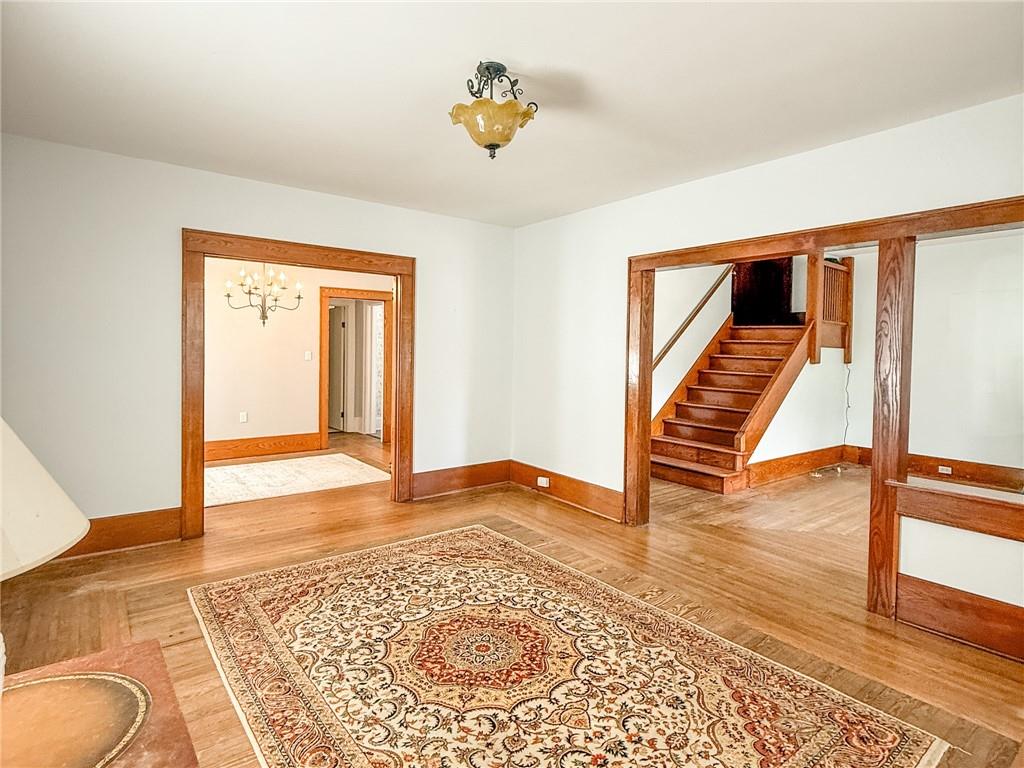 129 Missoura Street Somerset, PA 15501 - Photo 10 of 50 a view of an empty room with wooden floor and a window