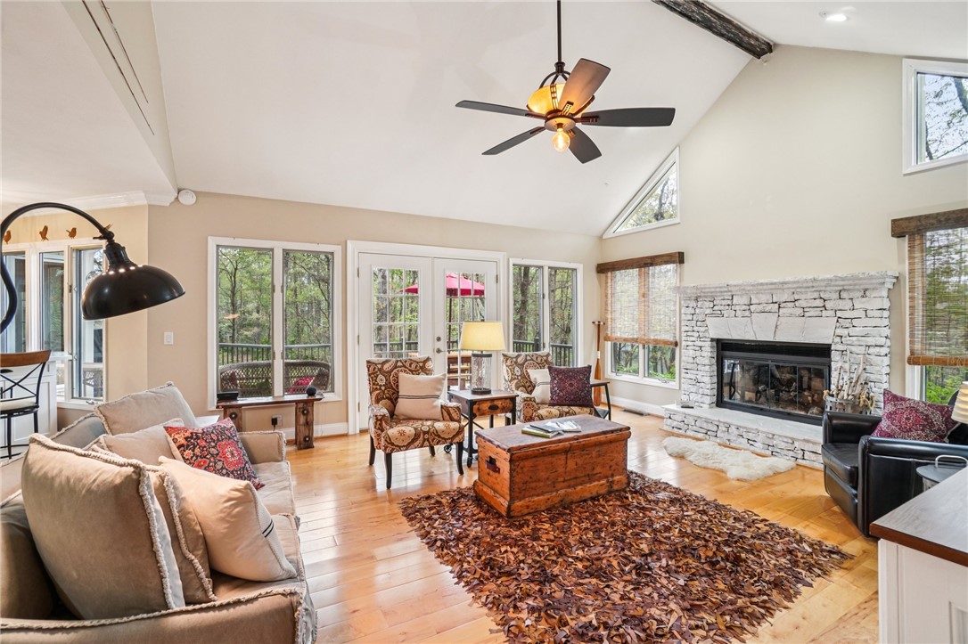 120 Beacon Ridge Circle Salem, SC 29676 - Photo 11 of 49 Bright and airy great room with a stone fireplace and vaulted ceilings.