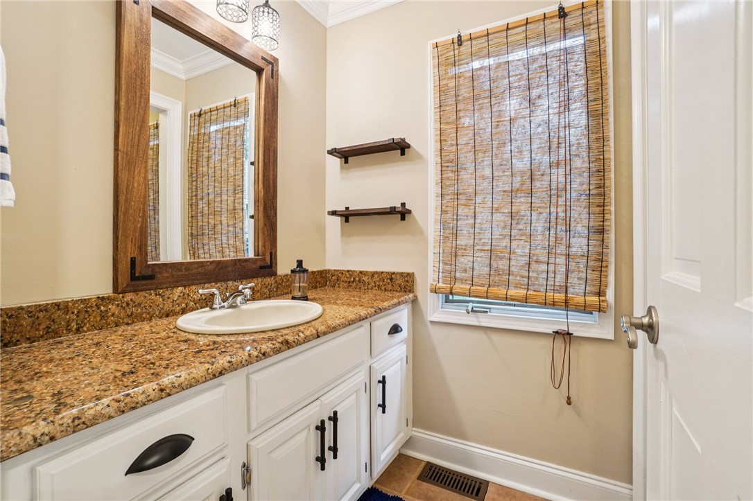 120 Beacon Ridge Circle Salem, SC 29676 - Photo 26 of 49 This bright bathroom features a spacious vanity with elegant granite counters and a large mirror.