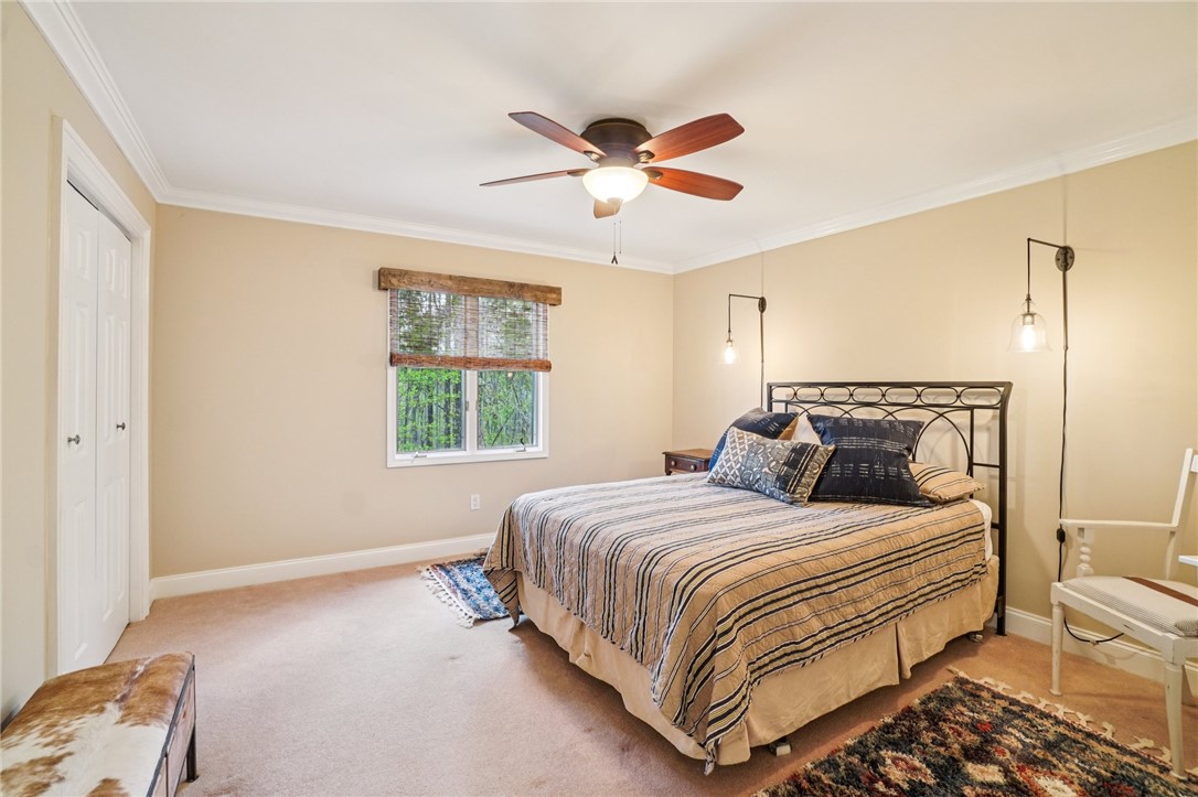 120 Beacon Ridge Circle Salem, SC 29676 - Photo 29 of 49 This cozy bedroom features warm tones, soft lighting, and ample natural light, perfect for serene living.