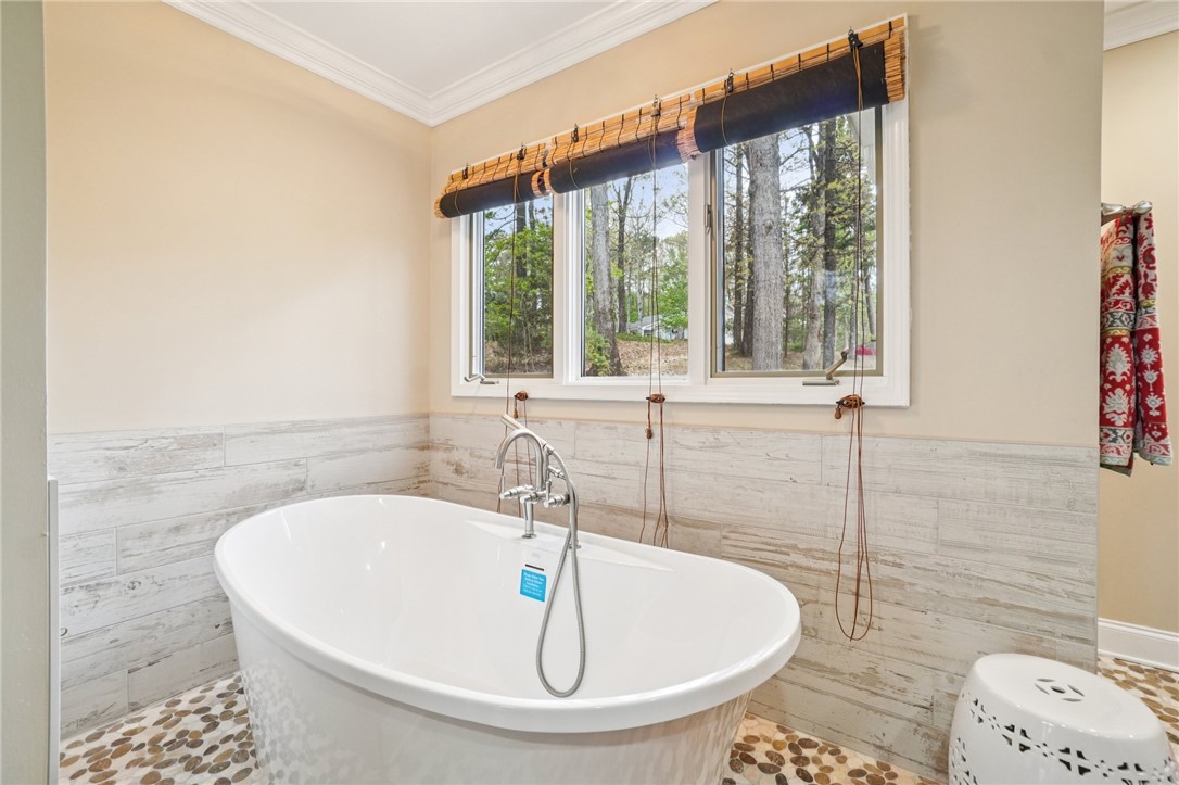 120 Beacon Ridge Circle Salem, SC 29676 - Photo 33 of 49 This serene bathroom offers a luxurious soaking tub, perfect for unwinding after a long day.