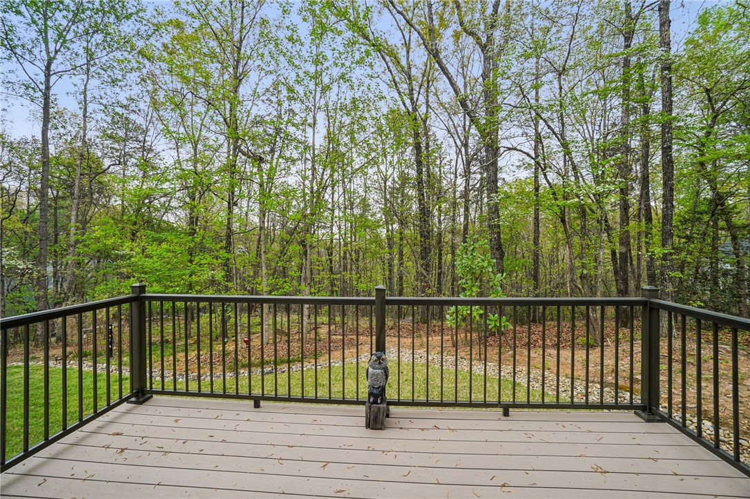 120 Beacon Ridge Circle Salem, SC 29676 - Photo 39 of 49 Enjoy tranquil woodland scenery from this private deck, perfect for peaceful moments outdoors.