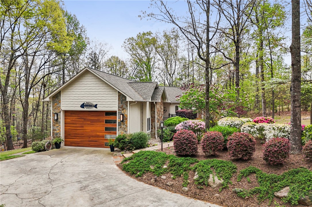 120 Beacon Ridge Circle Salem, SC 29676 - Photo 4 of 49 This charming home offers a welcoming facade with a beautiful natural landscape.